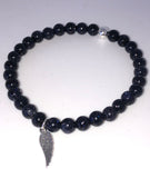 Blue goldstone bracelet with silver angel wing charm