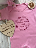 personalised pink baby grow and wooden hanging heart 